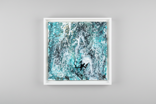 Abstract art piece with teal, black, and white colors in a white frame.